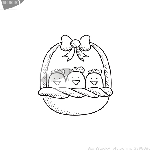 Image of Basket full of easter chicks sketch icon.