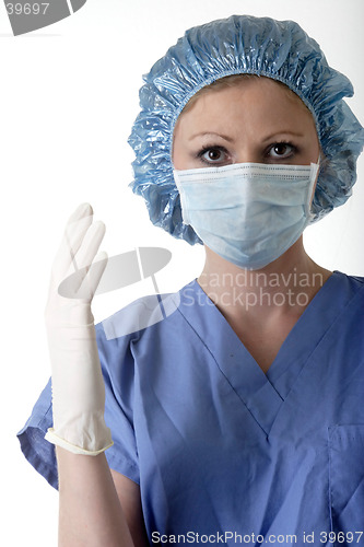 Image of Lady surgeon getting ready for surgery