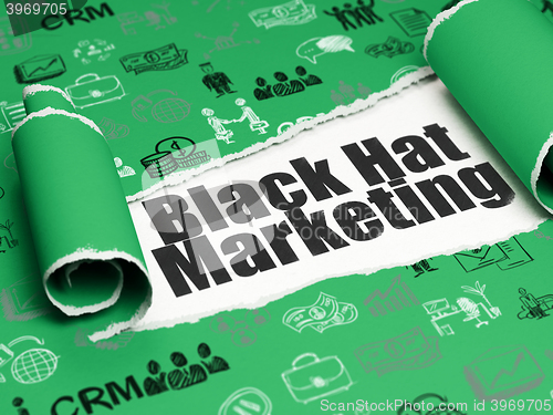 Image of Finance concept: black text Black Hat Marketing under the piece of  torn paper