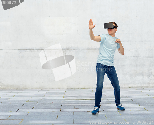 Image of man in virtual reality headset or 3d glasses