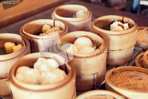 Image of meat or rice balls in wooden containers