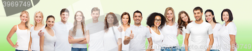 Image of group of happy different people in white t-shirts