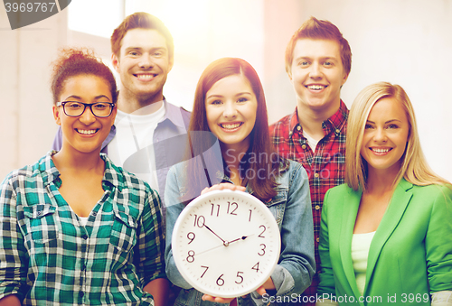 Image of group of students at school with clock