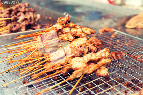 Image of meat grill at street market