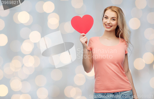 Image of happy woman or teen girl with red heart shape
