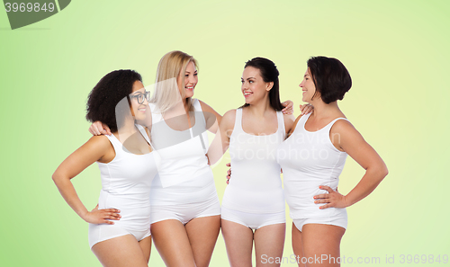 Image of group of happy different women in white underwear