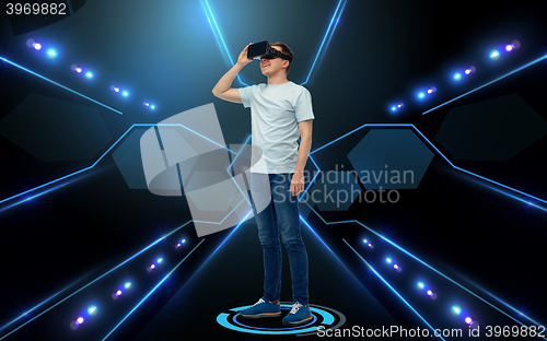 Image of happy man in virtual reality headset or 3d glasses