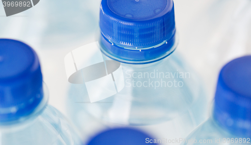 Image of close up of plastic bottles with drinking water