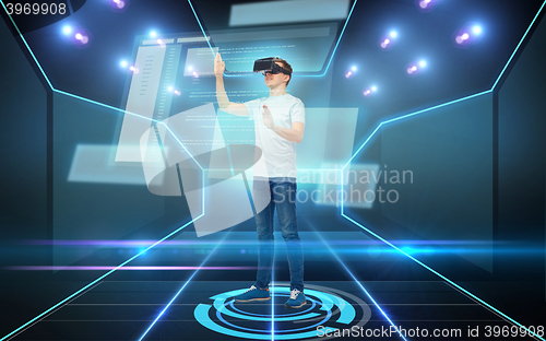 Image of happy man in virtual reality headset or 3d glasses