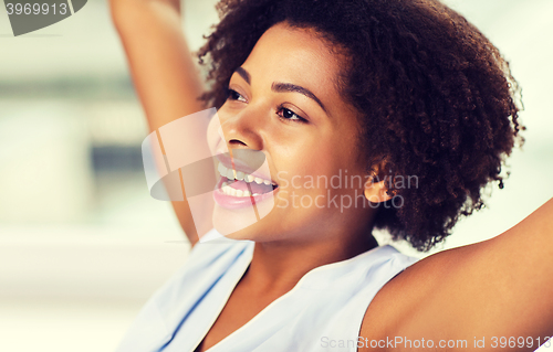 Image of face of happy african american young woman