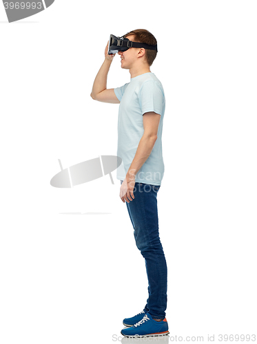 Image of happy man in virtual reality headset or 3d glasses