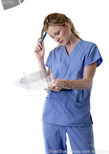 Image of Nurse studying patient chart