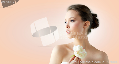 Image of beautiful asian woman with flower and jewelry