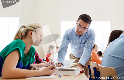 Image of group of students and teacher at school classroom