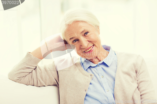 Image of happy senior woman at home