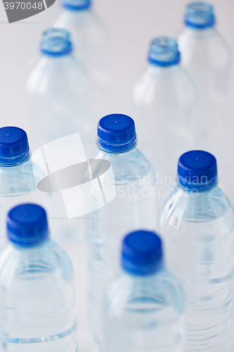 Image of close up of plastic bottles with drinking water