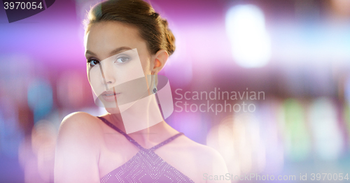 Image of beautiful young asian woman with earring