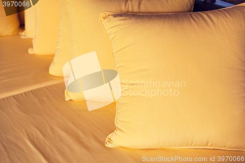 Image of couch with pillows at hotel