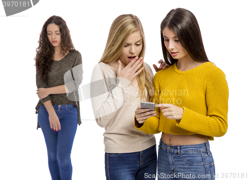 Image of Teenage girls gossiping