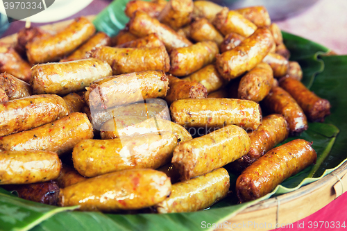 Image of grilled sausages at street market