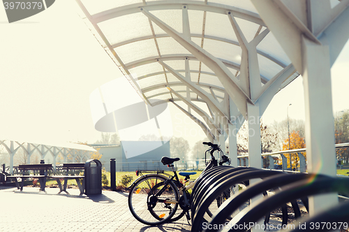 Image of close up of bicycle street parking outdoors