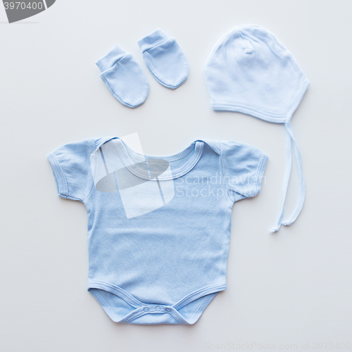 Image of close up of baby boys clothes for newborn on table