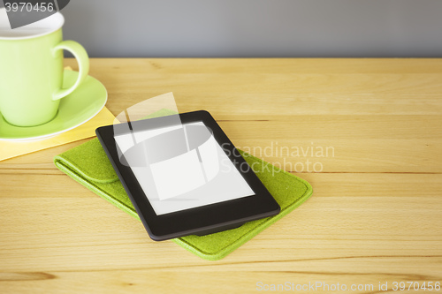 Image of ebook reader on a wooden table