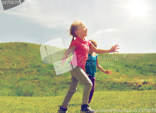 Image of group of happy kids running outdoors