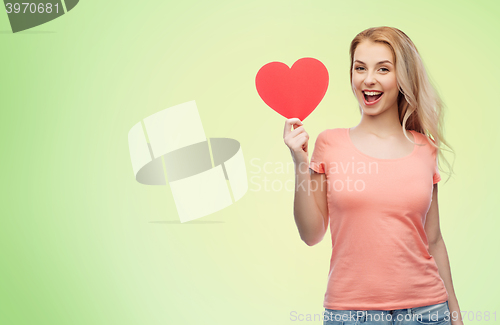 Image of happy woman or teen girl with red heart shape