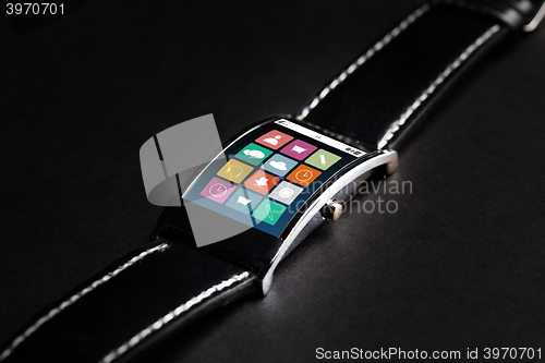 Image of close up of smart watch with menu icons on screen