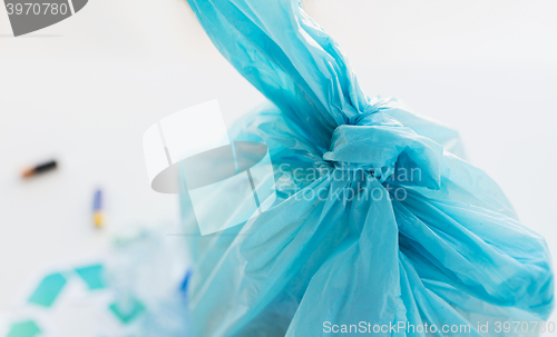 Image of close up of rubbish bag with trash at home