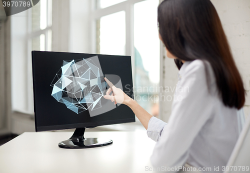 Image of businesswoman with projection on computer