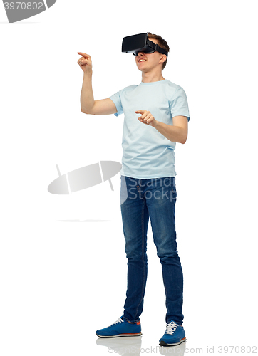 Image of happy man in virtual reality headset or 3d glasses