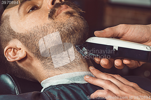 Image of Hipster client visiting barber shop