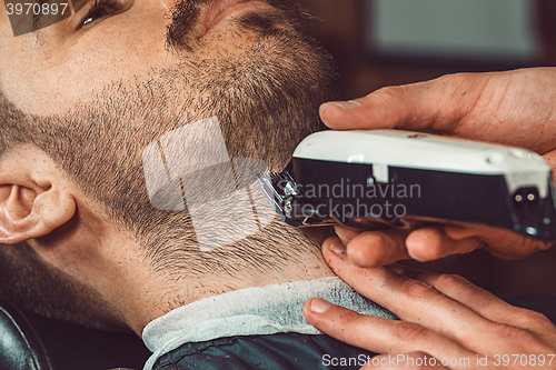 Image of Hipster client visiting barber shop