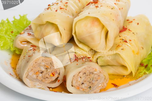 Image of cabbage rolls with carrots and rice