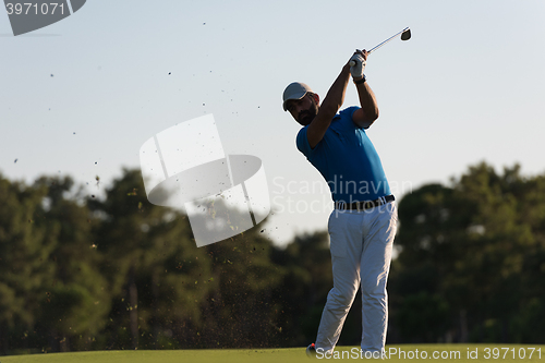 Image of golfer hitting long shot