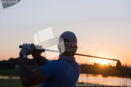 Image of golfer hitting long shot