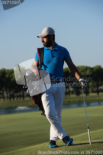 Image of golfer  portrait at golf  course