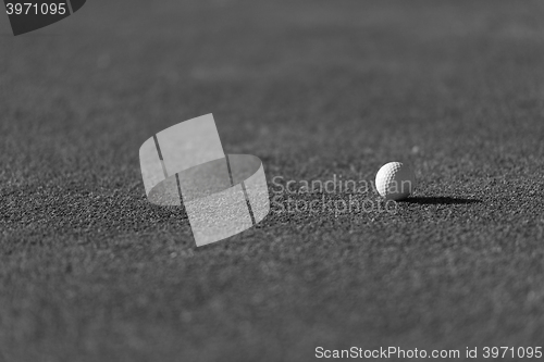 Image of golf ball on grass