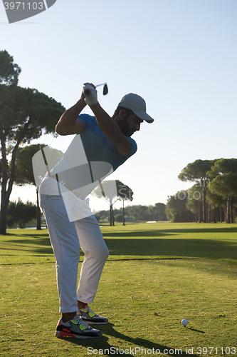 Image of golf player hitting shot