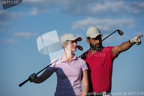 Image of portrait of couple on golf course