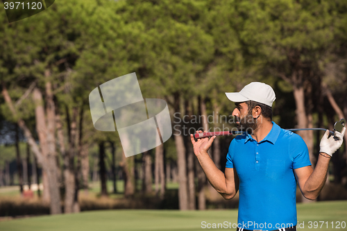 Image of golf player portrait at course