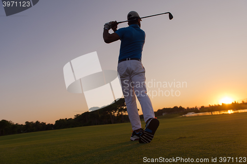 Image of golfer hitting long shot