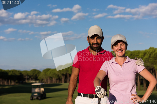 Image of portrait of couple on golf course