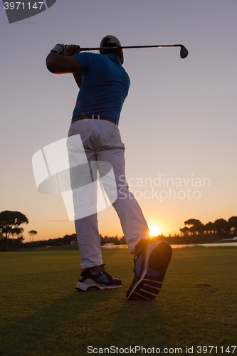 Image of golfer hitting long shot