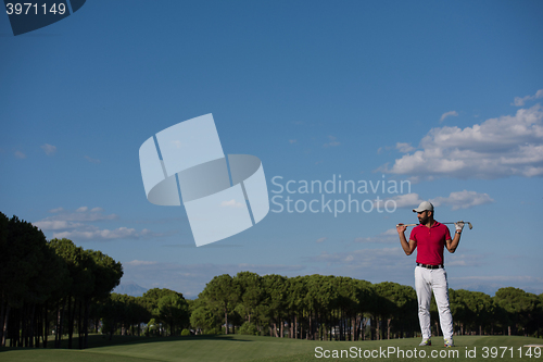 Image of handsome middle eastern golf player portrait at course