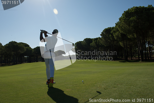 Image of golf player hitting shot