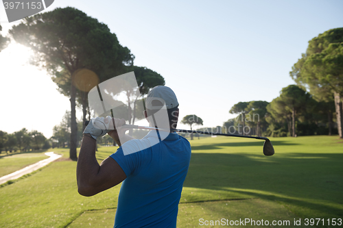 Image of golf player hitting shot