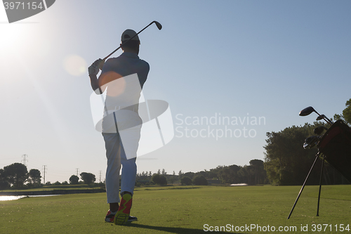 Image of golf player hitting shot